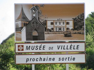 Panneau direction Musée de Villele